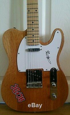 Angus Young,'AC DC lead guitarist' hand signed full size new Telecaster guitar