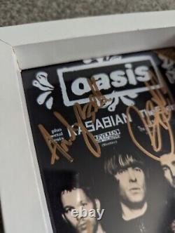 Hand Signed Oasis Photo