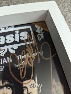 Hand Signed Oasis Photo