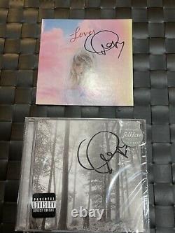 Taylor Swift Autographed Hand Signed Lover and Folklore CD Albums