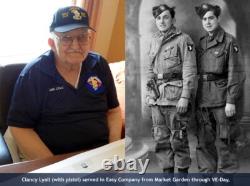 The Band of Brothers celebrate VE-Day autographed by Dick Winters' paratroopers