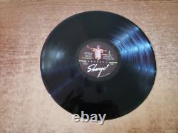 DISQUE VINYLE 33 TOURS SIGNÉ À LA MAIN SANTANA SHANGO 38122 VG++ DES ANNÉES 1980