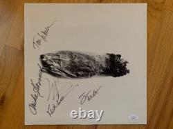 Feuille de paroles de Minute By Minute signée à la main par les Doobie Brothers, 5 signatures JSA