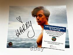 Harry Styles a signé une photo originale de 7x5 pouces avec une AUTOGRAHE avec COA