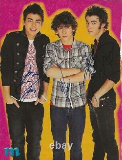 Page de magazine des Jonas Brothers réellement signée à la main n°1 JSA LOA Autographiée par les 3