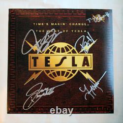 Photo 11x11 de TESLA band signée à la main avec authentification COA, autographiée par Tommy Skeoch +4.